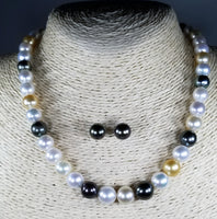 Beautiful Strand of South Sea Pearls in Multi Color with Studs in Solid White Go