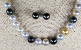 Beautiful Strand of South Sea Pearls in Multi Color with Studs in Solid White Go