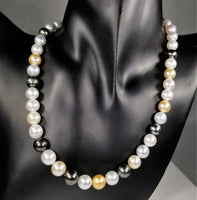 Beautiful Strand of South Sea Pearls in Multi Color with Studs in Solid White Go
