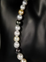 Beautiful Strand of South Sea Pearls in Multi Color with Studs in Solid White Go