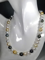 Beautiful Strand of South Sea Pearls in Multi Color with Studs in Solid White Go